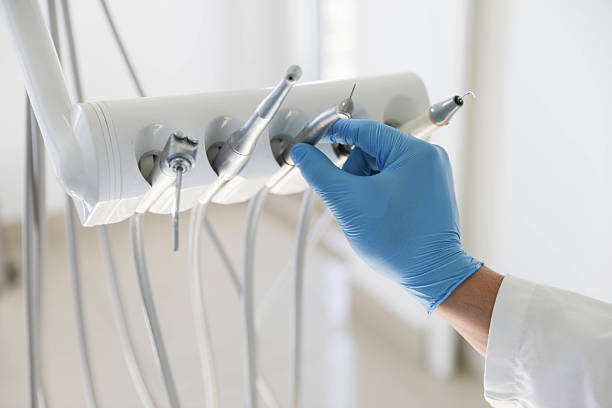 Professional Tooth Extraction technician working in Morristown, NJ